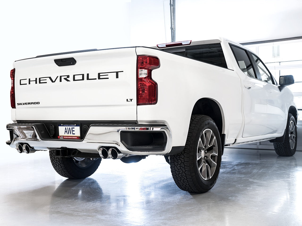 AWE Tuning 19-22 4th Gen GM 1500 5.3L 0FG Catback Split Rear Exit (w/ Bumper Cutouts) - Quad Chrome Tips 3015-42201