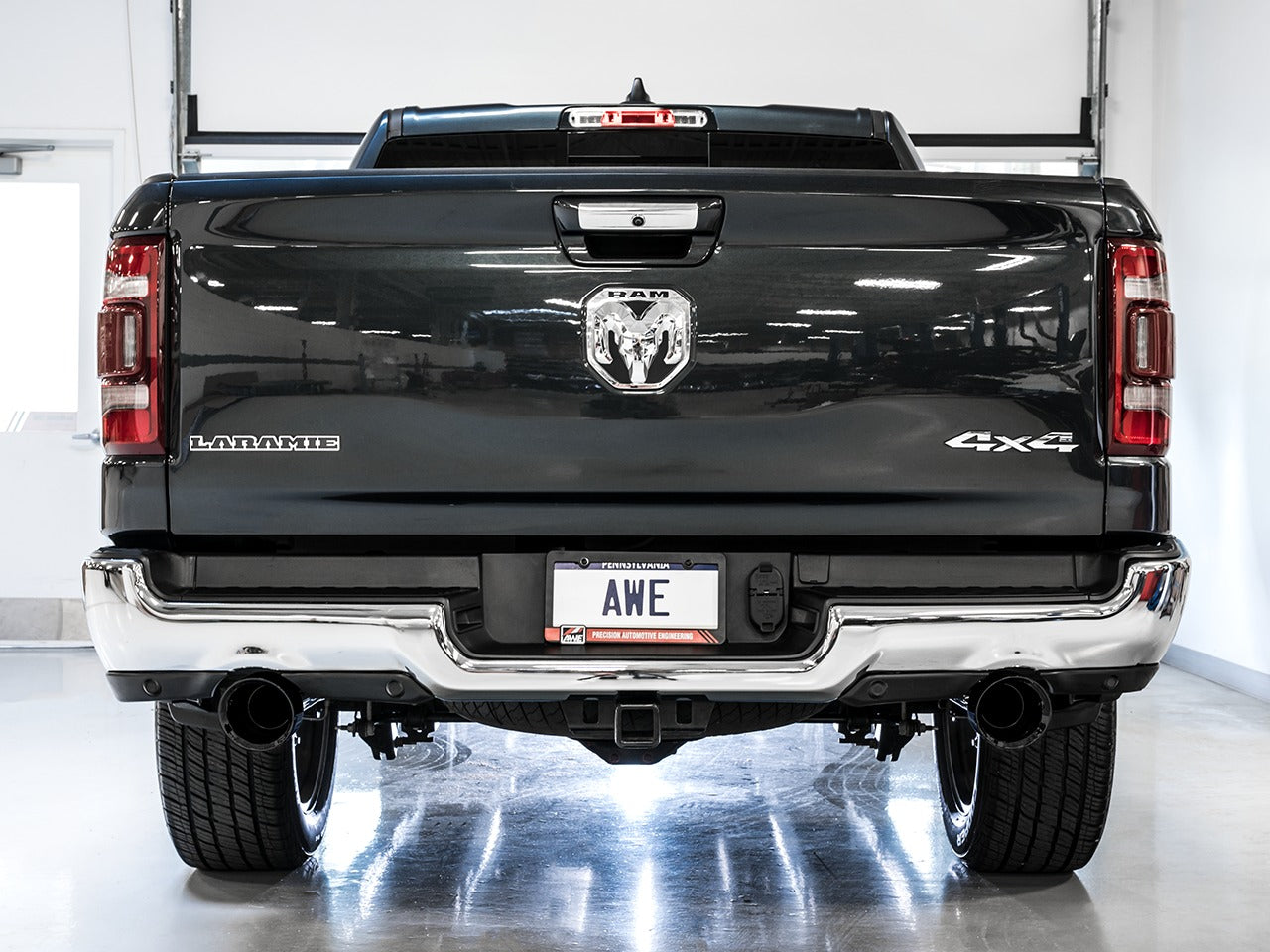 AWE Tuning 19-22 RAM 1500 5.7L (w/Cutouts) 0FG Dual Rear Exit Cat-Back Exhaust - Diamond Black Tips 3015-33006