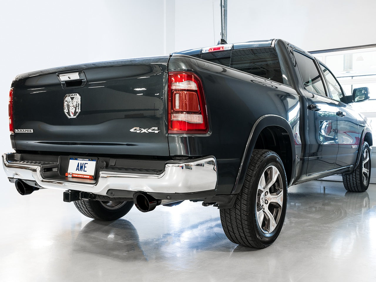 AWE Tuning 19-22 RAM 1500 5.7L (w/Cutouts) 0FG Dual Rear Exit Cat-Back Exhaust - Diamond Black Tips 3015-33006