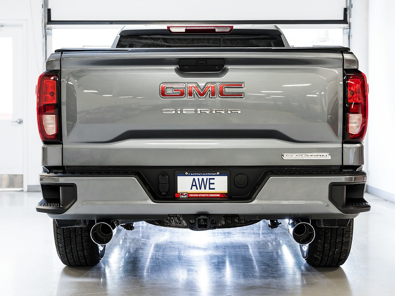 AWE Tuning 19-22 4th Gen GM 1500 5.3L 0FG Catback Split Rear Exit (Flat Bumper) - Quad Chrome Tips 3015-32205