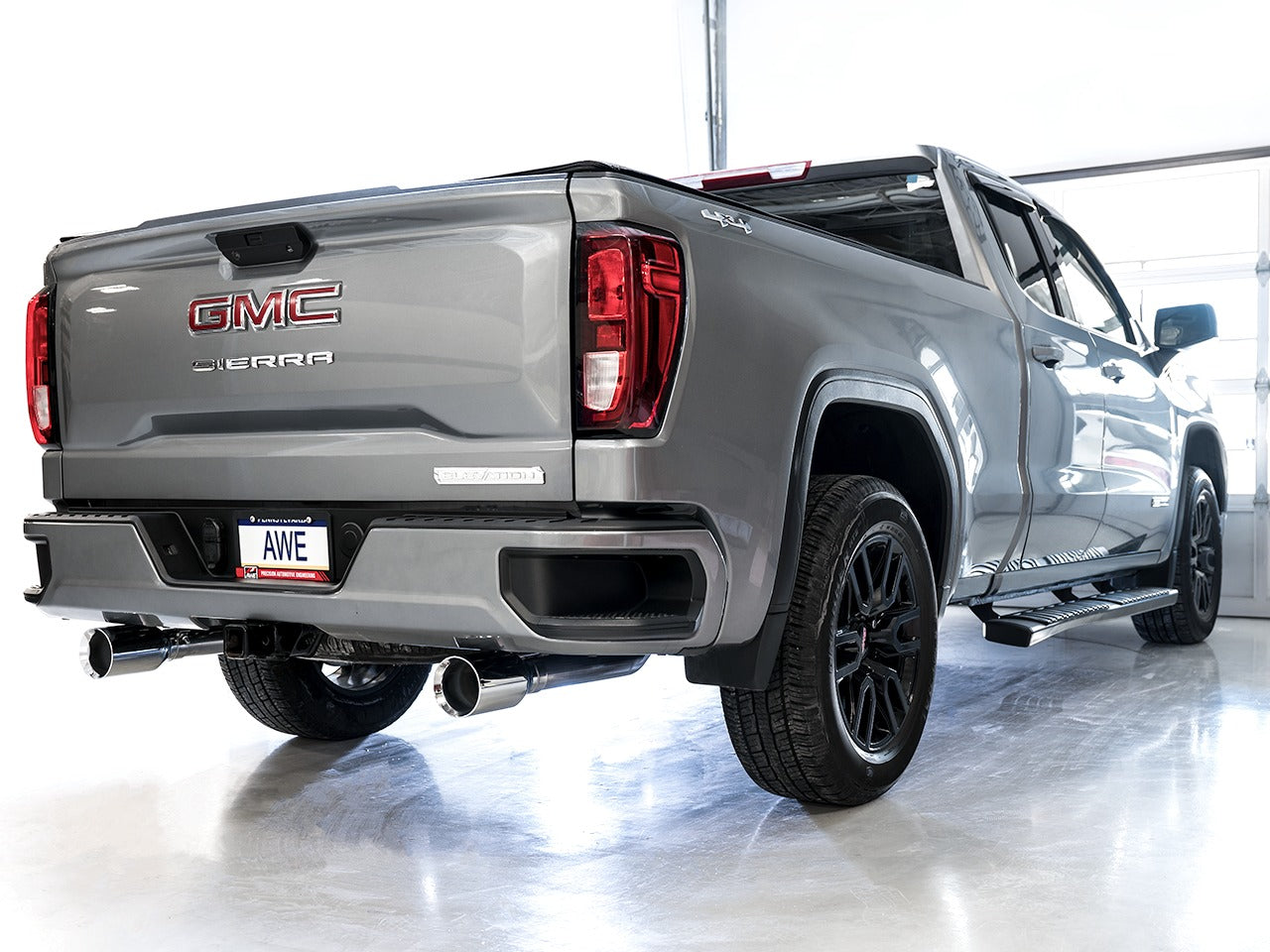 AWE Tuning 19-22 4th Gen GM 1500 5.3L 0FG Catback Split Rear Exit (Flat Bumper) - Quad Chrome Tips 3015-32205
