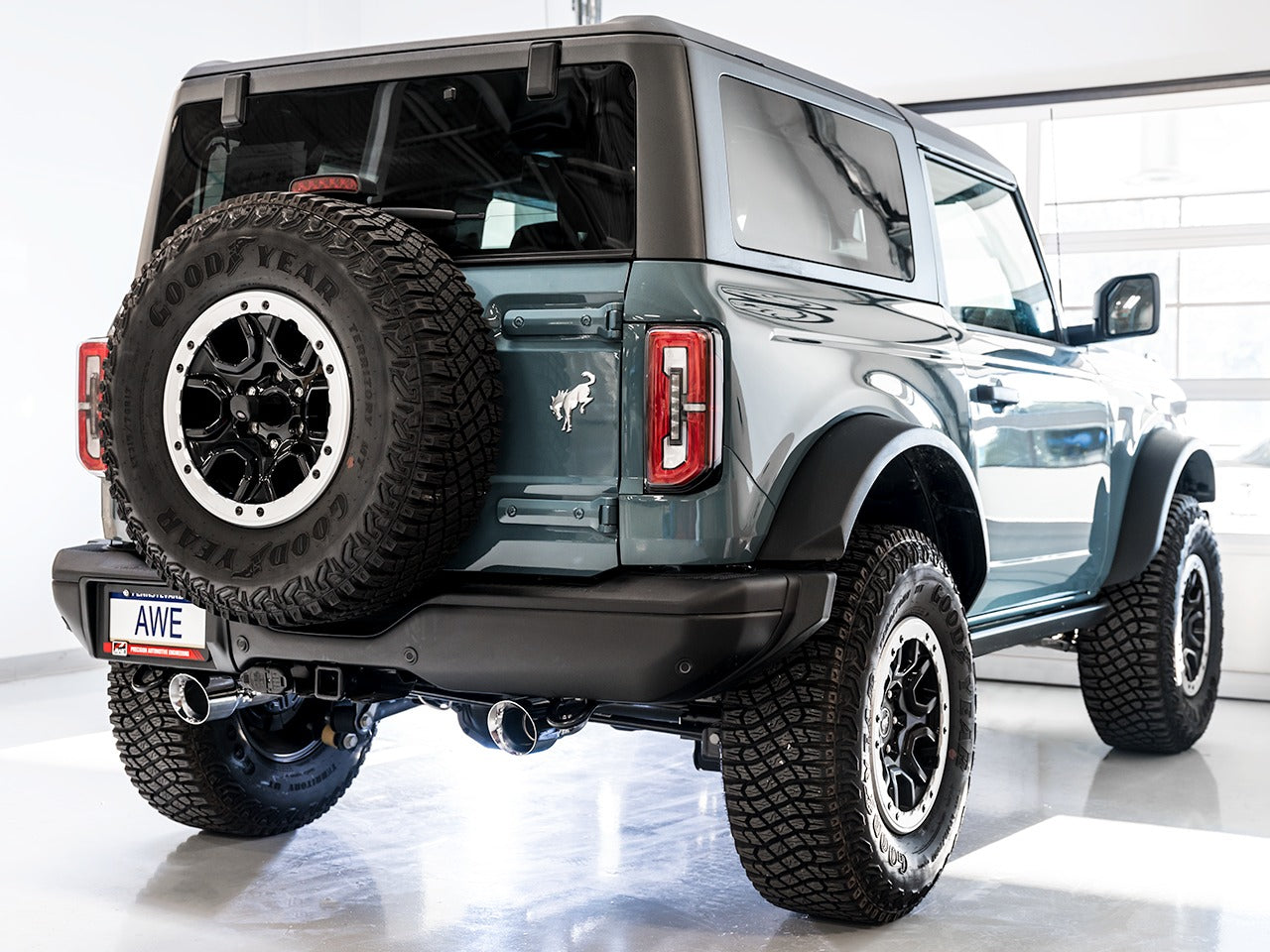 AWE Tuning 21-22 Ford Bronco 0FG Dual Rear Exit Exhaust w/Chrome Silver Tips & Bash Guard 3015-32456