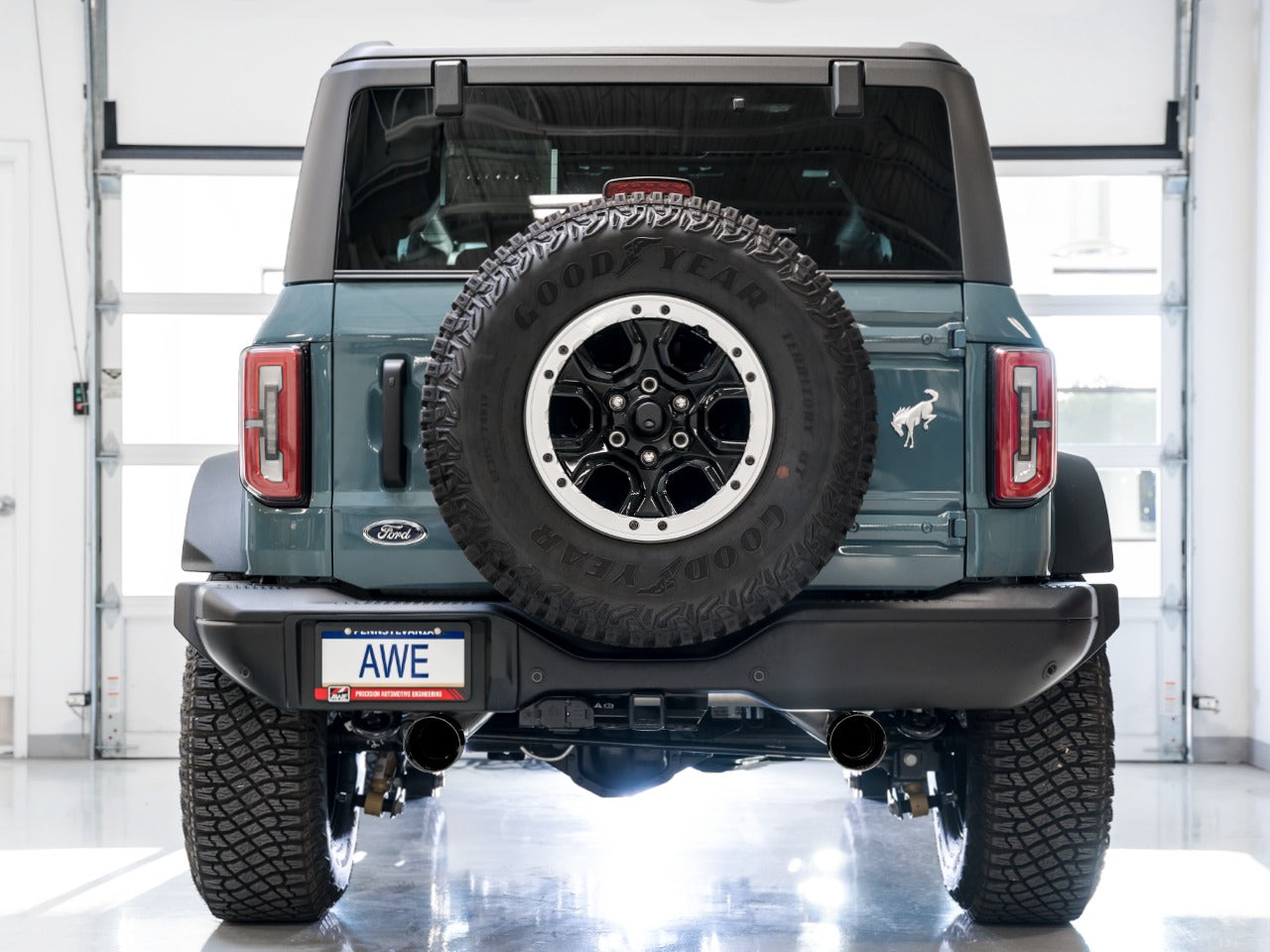 AWE Tuning 21-22 Ford Bronco 0FG Dual Rear Exit Exhaust w/Diamond Black Tips & Bash Guard 3015-33456